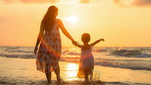 Mother and child on a beach