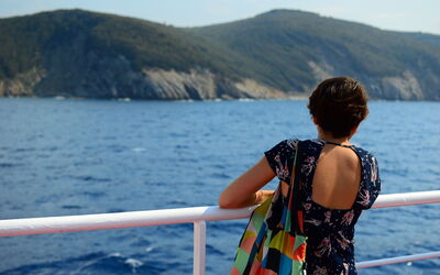 Girl overlooking Tuscan Coast