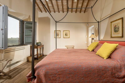 A bedroom in Podere D'Asso