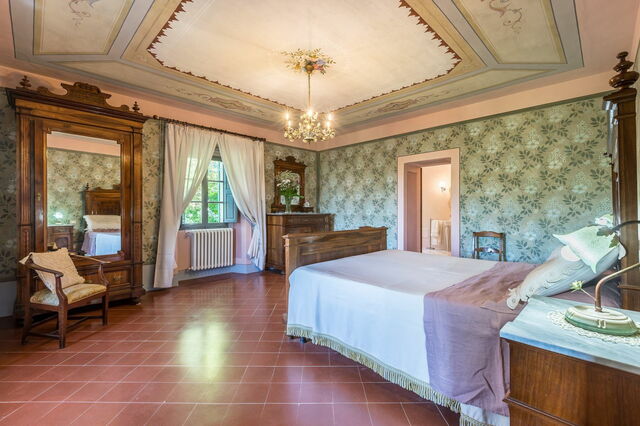 A bedroom at Palazzo Rosadi