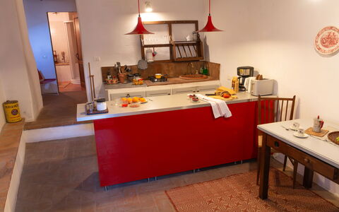 La Miccia: Furniture, Flooring, Interior Design, Kitchen, Countertop, Lighting, Floor, Cabinetry, Room, Kitchen Appliance