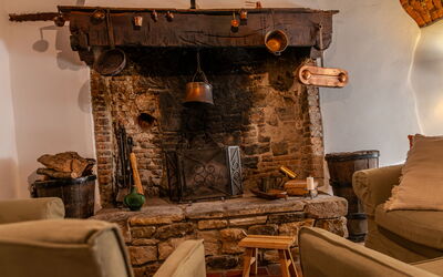 Casa Di Vignolo: Furniture, Wood, Interior Design, Lighting, Living Room, Room, Chair, Hearth, Hardwood, Natural Material