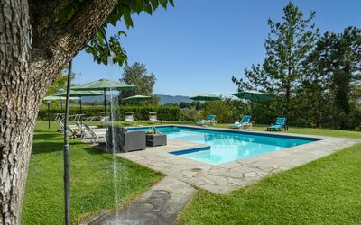 Villa La Collina: Water, Plant, Sky, Swimming Pool, Azure, Shade, Tree, Building, Outdoor Furniture, Land Lot
