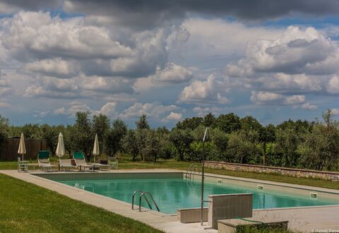Agriturismo La Papessa: Water, Cloud, Sky, Plant, Tree, Azure, Swimming Pool, Natural Landscape, Land Lot, Shade