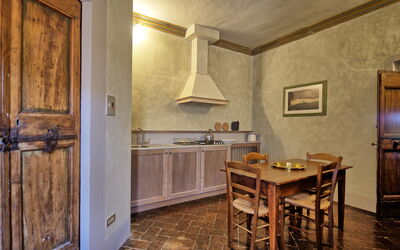 Cupola: Furniture, Cabinetry, Table, Countertop, Kitchen, Wood, Interior Design, Architecture, Wood Stain, Flooring