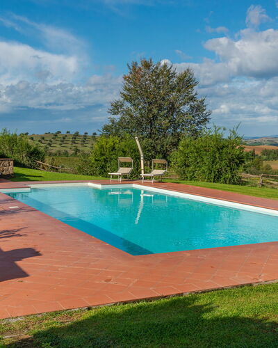 Poggio Campana: Water, Cloud, Sky, Plant, Property, Swimming Pool, Building, Nature, Azure, Tree