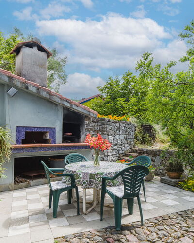 Casa Melograno: Garden, Cottage, Landscaping, Backyard, Flowerpot, Flagstone, Yard, Houseplant, Chair, Stone Wall