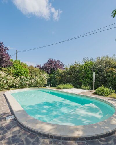 Villa Ulivo: Water, Sky, Plant, Property, Cloud, Swimming Pool, Nature, Botany, Azure, Architecture