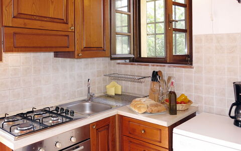L'Uccelliera: Countertop, Cabinetry, Kitchen, Room, Furniture, Property, Drawer, Interior Design, Sink, Tile
