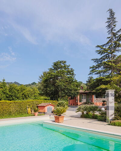 Verde Versilia: Water, Plant, Cloud, Property, Sky, Swimming Pool, Tree, Natural Landscape, Shade, Grass