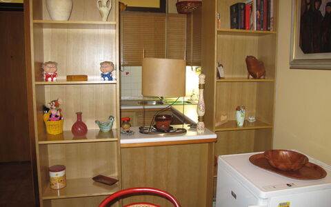 Sea House: Furniture, Property, Cabinetry, Picture Frame, Kitchen, Shelving, Kitchen Appliance, Interior Design, Building, Home Appliance