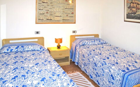 Sea House: Bedroom, Bed, Bed Sheet, Room, Bedding, Furniture, Property, Bed Frame, Duvet Cover, Blue