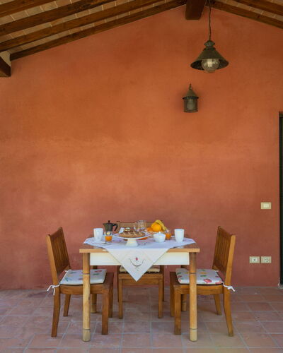 Nido del Sorbino: Table, Furniture, Plant, Building, Tableware, Wood, Chair, Interior Design, House, Shade
