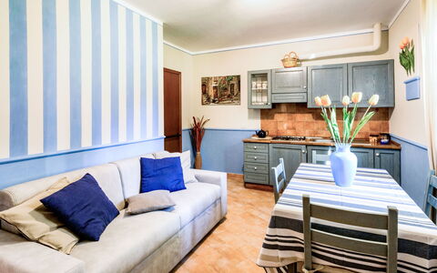 Scarlino 614: Room, Furniture, Living Room, Property, Interior Design, Blue, Building, Wall, Real Estate, Table