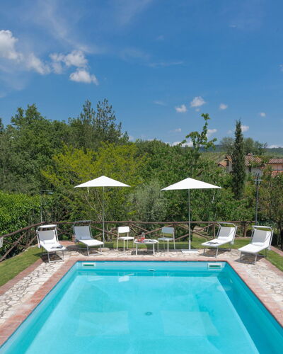 Villa del Poggio: Water, Plant, Cloud, Sky, Property, Furniture, Swimming Pool, Umbrella, Tree, Nature