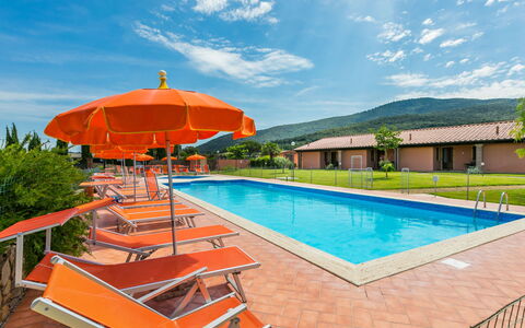 Scarlino 648: Cloud, Sky, Water, Swimming Pool, Plant, Umbrella, Building, Shade, Outdoor Furniture, Tree