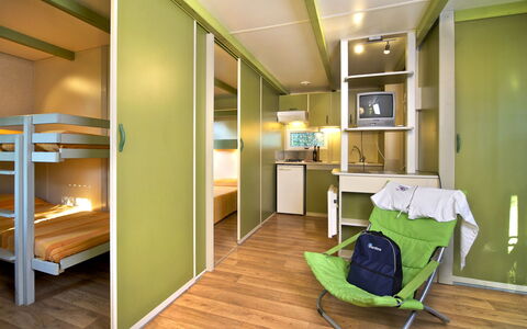 Camping Village Il Fontino: Room, Green, Interior Design, Furniture, Building, Property, Ceiling, House, Bed, Floor