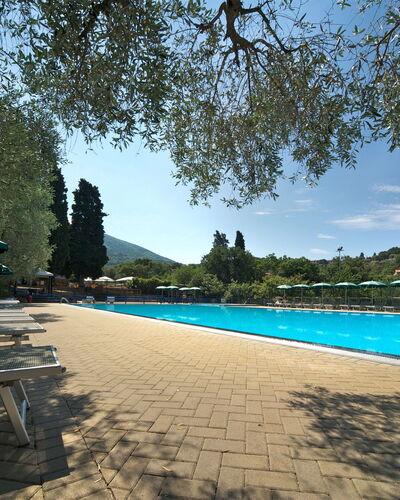 Camping Village Il Fontino: Swimming Pool, Sky, Tree, Vacation, Resort, Leisure, Tourism, Sea, Mountain, Tropics