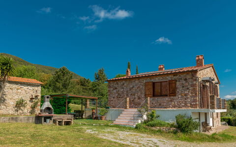 Valmarinella: Sky, Plant, Cloud, Building, Window, Ecoregion, Tree, Natural Landscape, House, Land Lot