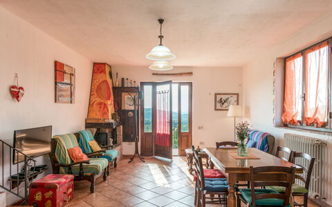 Valmarinella: Table, Furniture, Property, Window, Picture Frame, Chair, Azure, Wood, Interior Design, Flooring