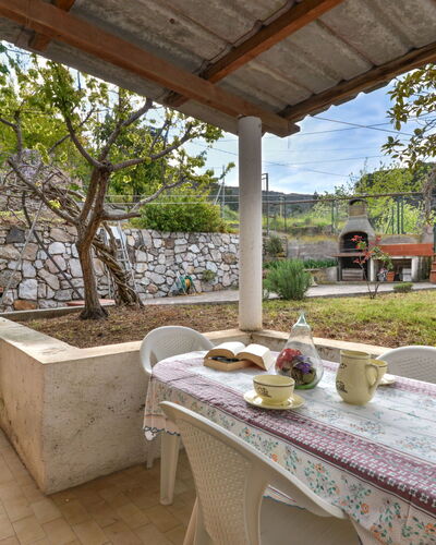 Al Tramonto: Plant, Property, Table, Shade, Interior Design, Outdoor Furniture, Tree, Flowerpot, Building, Landscape