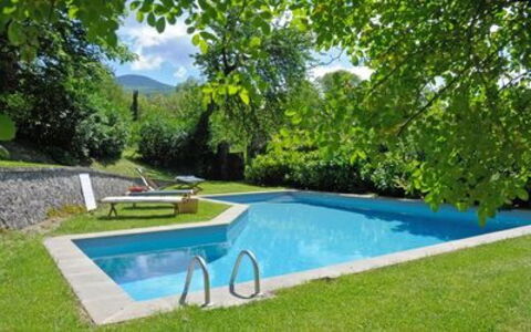 Casa Di Lilli: Water, Plant, Swimming Pool, Sky, Tree, Outdoor Furniture, Cloud, Natural Landscape, Landscape, Grass