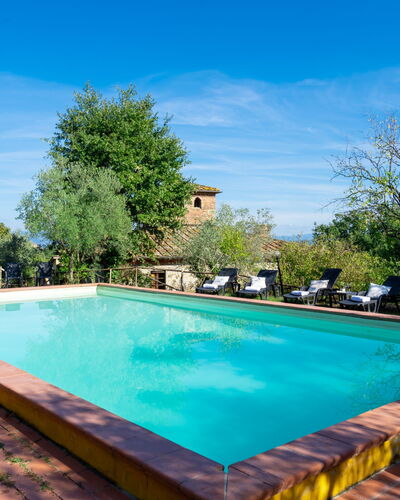 Poggio Cuccule: Water, Cloud, Sky, Property, Plant, Swimming Pool, Blue, Azure, Tree, Rectangle