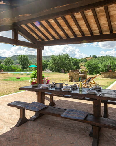 Casale Poggio Lupinaio: Plant, Sky, Property, Table, Shade, Wood, Interior Design, Tree, Outdoor Furniture, Outdoor Bench