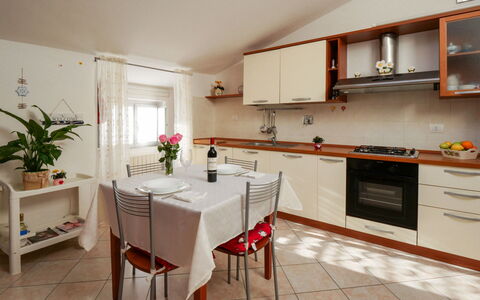Stefi: Furniture, Countertop, Cabinetry, Property, Plant, Building, Flowerpot, Tap, Table, Kitchen