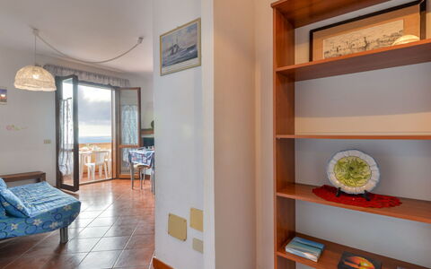 Terrazza di Paolo: Furniture, Wood, Shelf, Interior Design, Floor, Flooring, Hall, Picture Frame, Shelving, Living Room