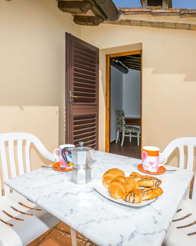 Dependance di Villa Magna: Table, Furniture, Tableware, Chair, Building, Wood, Window, Interior Design, Outdoor Furniture, Outdoor Table