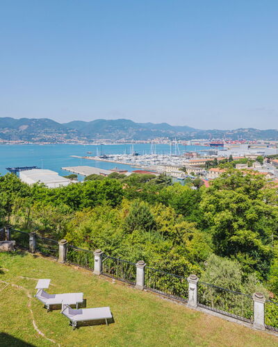Villa Diana: Sky, Water, Plant, Property, Mountain, Natural Landscape, Tree, Vegetation, Land Lot, Biome