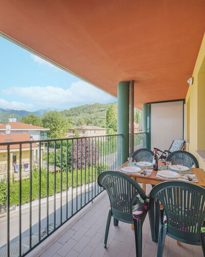 Appartamento Pietrasanta: Building, Sky, Property, Furniture, Plant, Table, Chair, Cloud, Wood, Shade