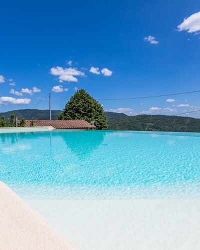 Red House: Sky, Water, Cloud, Blue, Natural Landscape, Rectangle, Aqua, Tree, Swimming Pool, Horizon