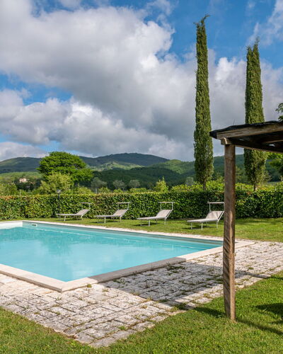 Pepi: Cloud, Water, Sky, Property, Plant, Blue, Swimming Pool, Shade, Tree, Rectangle