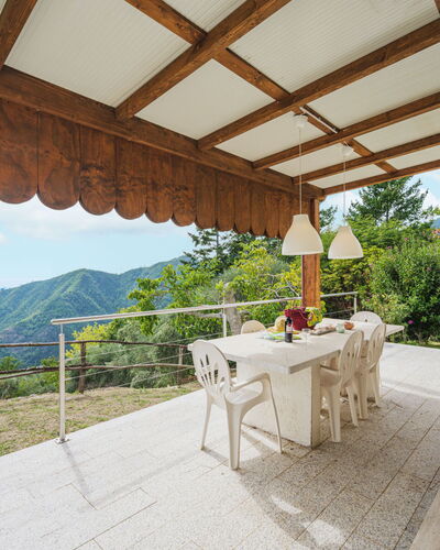 Casa Giulia: Plant, Property, Sky, Table, Shade, Wood, Outdoor Furniture, Building, Tree, Leisure