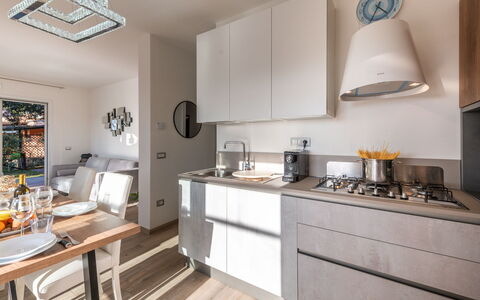 Villa Marzia Mare & Golf: Property, Countertop, Furniture, Cabinetry, Wood, Kitchen Stove, Architecture, Interior Design, Kitchen
