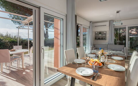 Villa Marzia Mare & Golf: Table, Furniture, Property, Chair, Wood, Interior Design, Tableware, Floor, Plant, Window