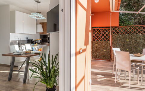 Villa Marzia Mare & Golf: Plant, Furniture, Table, Chair, Building, Houseplant, Orange, Wood, Door, Interior Design