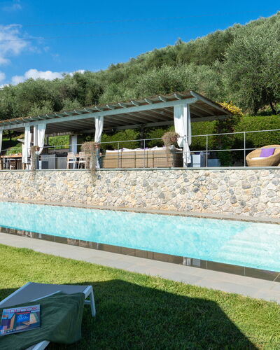 Villa Luxury Marignana: Sky, Cloud, Plant, Tree, Shade, Swimming Pool, Grass, Leisure, Urban Design, Recreation