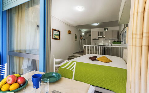 La Pineta: Interior Design, Furniture, Flooring, Floor, Room, Ceiling, Apartment, Bedroom, Home, Bed