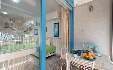 La Pineta: Furniture, Property, Table, Building, Interior Design, Comfort, Floor, Wood, Chair, Wall