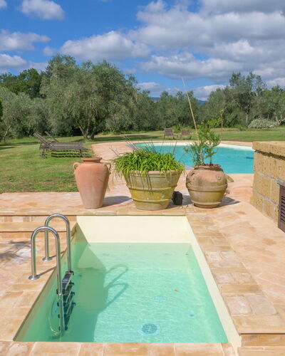 Il Piccione: Swimming Pool, Water Feature, Garden, Composite Material, Flagstone, Landscaping, Backyard, Resort, Tile, Shade