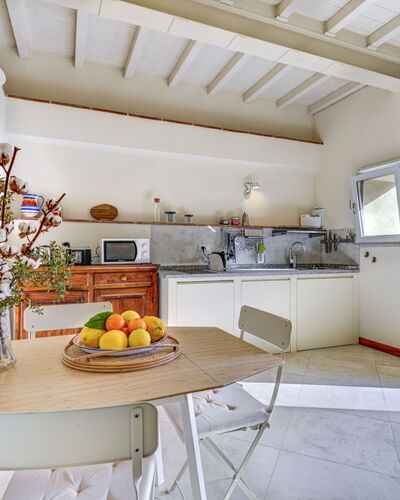 Marciana 210: Table, Furniture, Property, Cabinetry, Countertop, Window, Food, Interior Design, Wood, Building