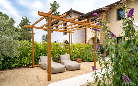 Nocellara Spereto Apartment With Pool, Montaione: Wood, Garden, Shade, Outdoor Structure, Backyard, Landscaping, Outdoor Furniture, Pergola, Wood Stain