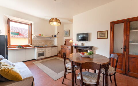 Nel Corso: Table, Picture Frame, Furniture, Wood, Chair, Couch, Living Room, Flooring, Home Appliance, Floor