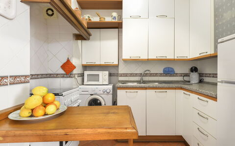 Il Marinaio: Countertop, Cabinetry, Property, Building, Kitchen, Wood, Kitchen Stove, Food, Interior Design, Flooring
