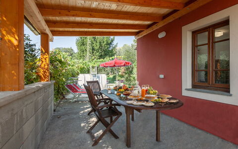 Casa Iris - Versilia, Holiday Home with Pool: Furniture, Property, Table, Building, Plant, Chair, Wood, Shade, Interior Design, Window