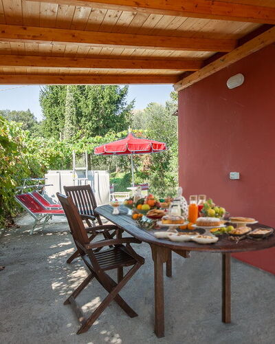 Casa Iris - Versilia, Holiday Home with Pool: Furniture, Property, Table, Building, Plant, Chair, Wood, Shade, Interior Design, Window