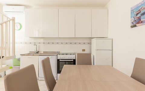Elena: Cabinetry, Table, Furniture, Countertop, Chair, Wood, Kitchen, Kitchen Stove, Flooring